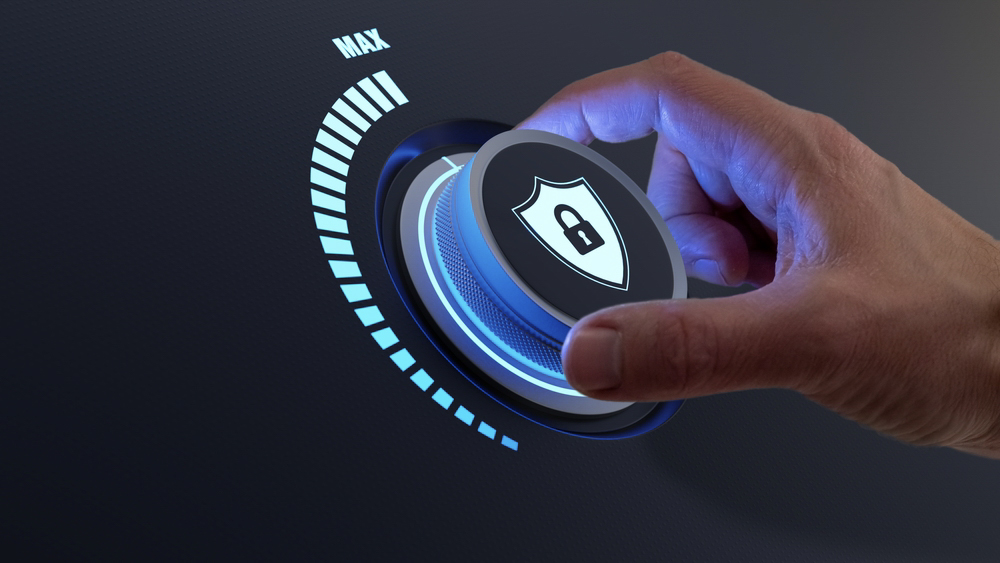e-BO Security concept with person increasing the protection level by turning a knob. Selecting highest defence against cyber attack. Digital crime and data privacy on internet. Cybersecurity.