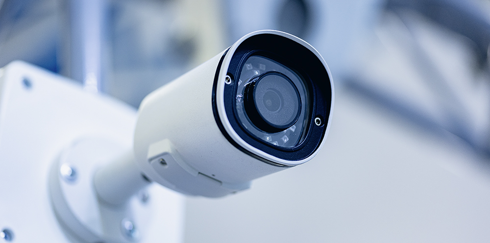 e-BO Modern Industry IP CCTV camera security system, blue color toning copy space.