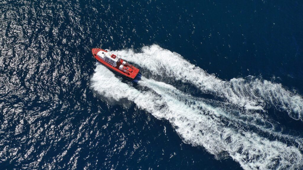 e-BO Aerial,Drone,Photo,Of,Red,Pilot,Boat,Cruising,In,High
